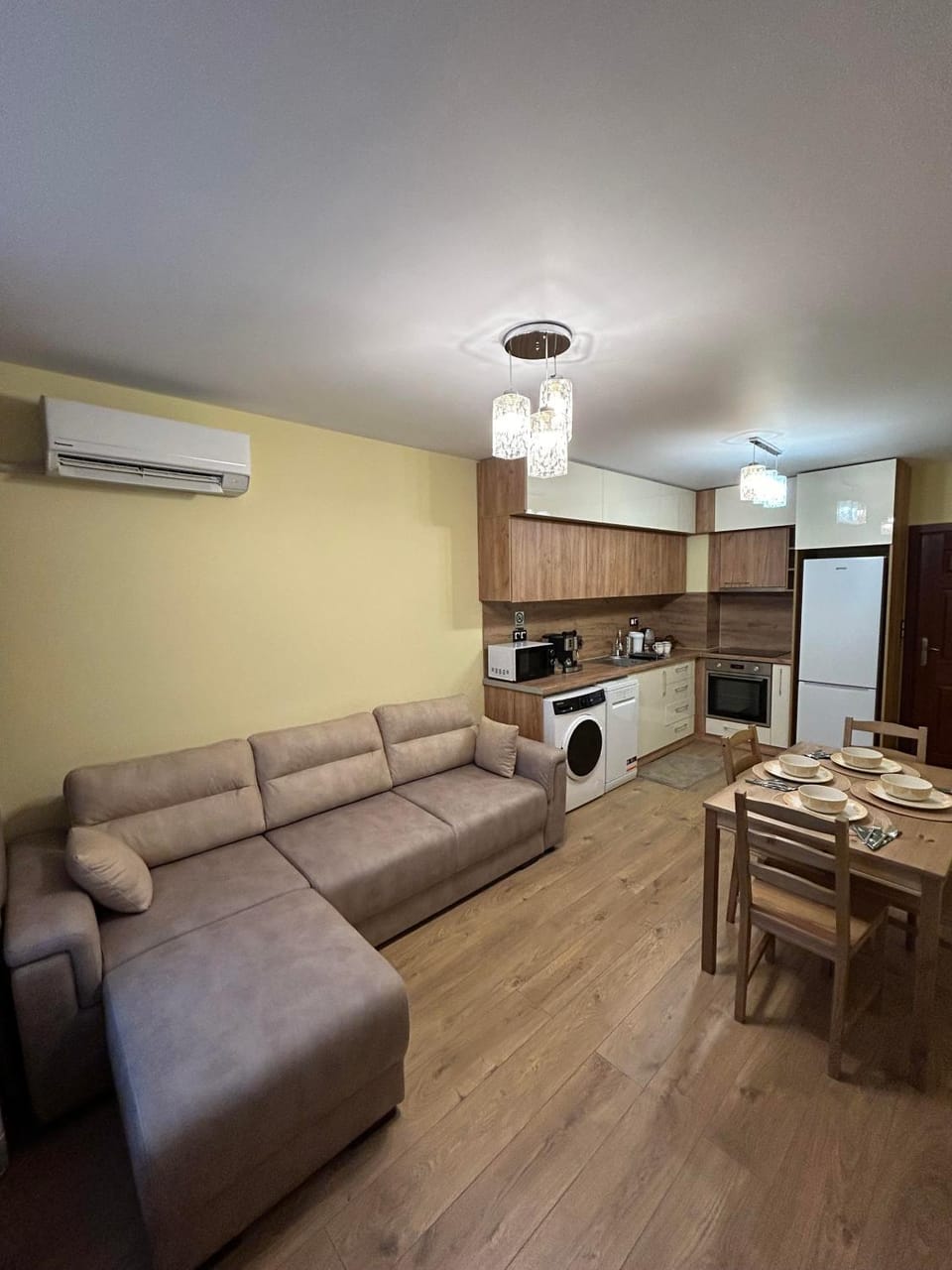 Kitchen or kitchenette, Living room, Seating area, Dining area, oven, stove, air conditioner