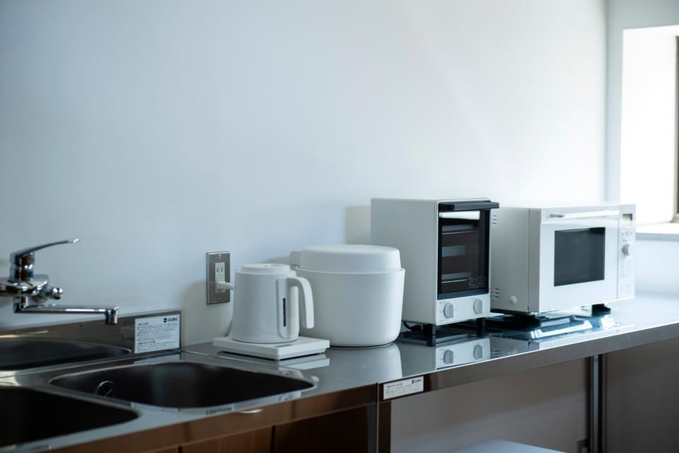 Kitchen or kitchenette, microwave, toaster