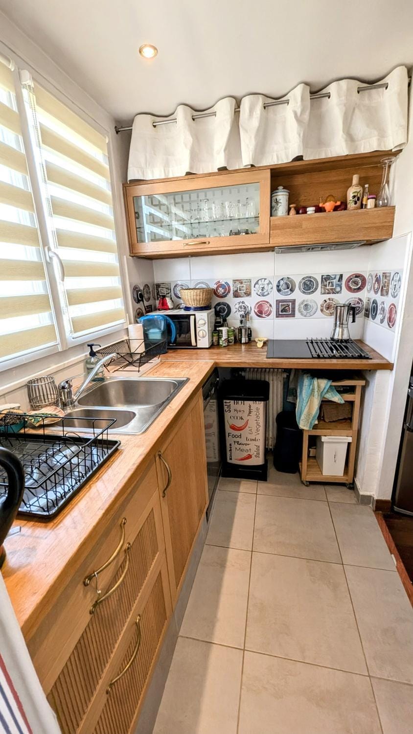 Kitchen or kitchenette, stove, toaster