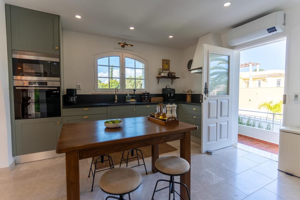 Kitchen or kitchenette, dishwasher, oven, toaster, kitchen, air conditioner