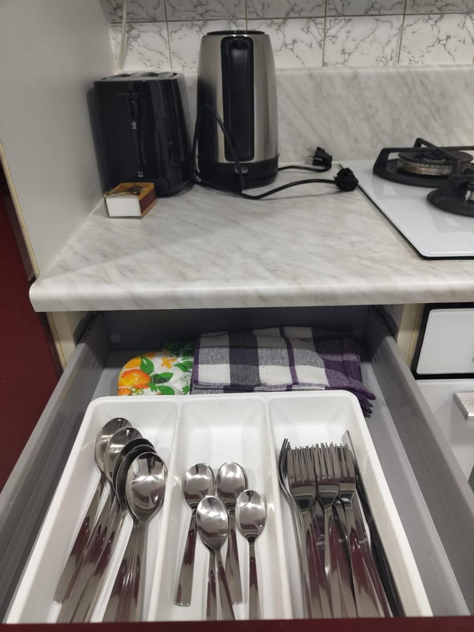 Kitchen or kitchenette, toaster