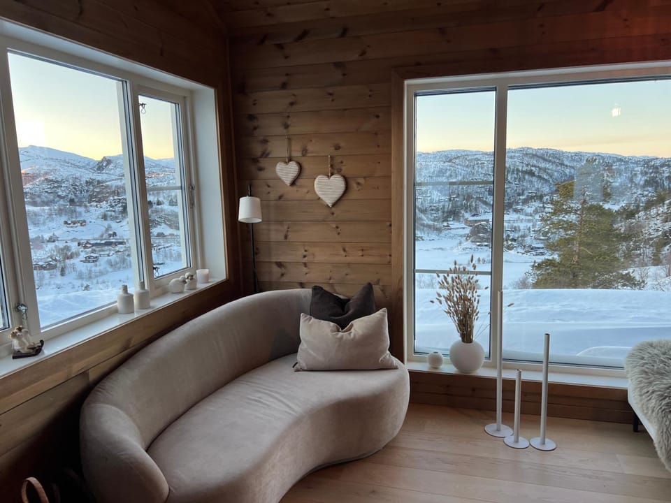 Natural landscape, Winter, View (from property/room), Living room, Seating area, Mountain view