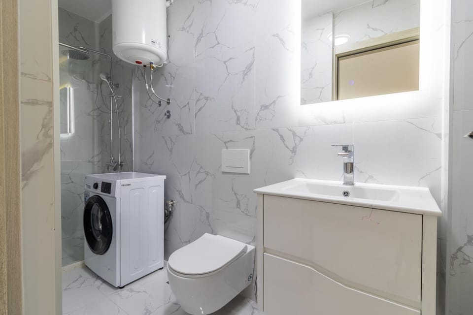 Bathroom, towels, washing machine