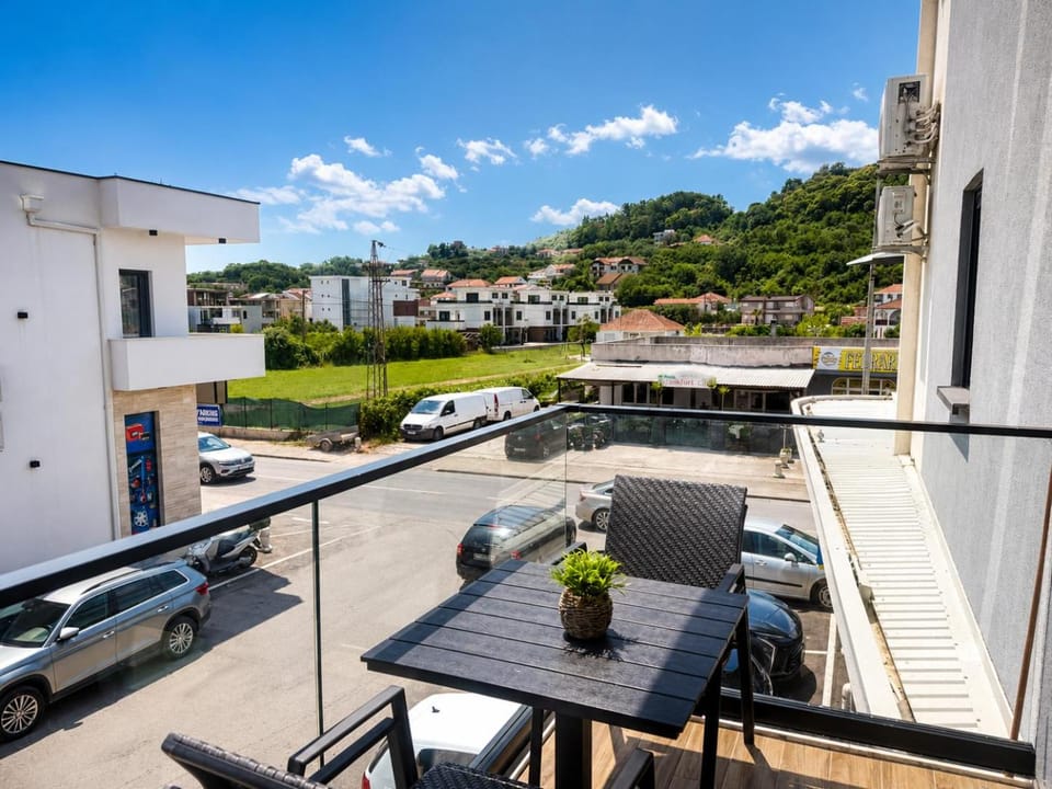 Property building, Patio, Day, View (from property/room), Balcony/Terrace, Parking