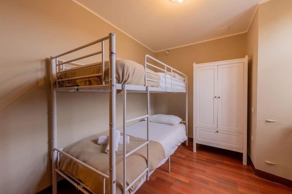 Bed, Photo of the whole room, Bedroom, bunk bed, towels, wardrobe