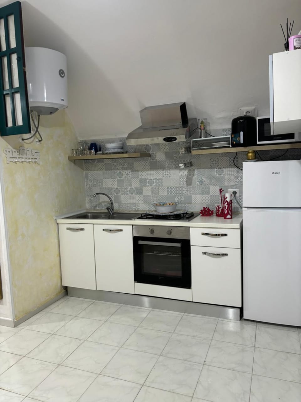 Kitchen or kitchenette, oven, stove