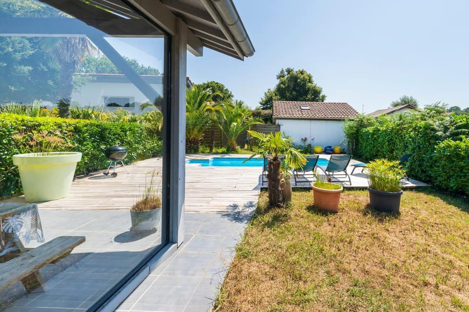 Property building, Living room, Swimming pool