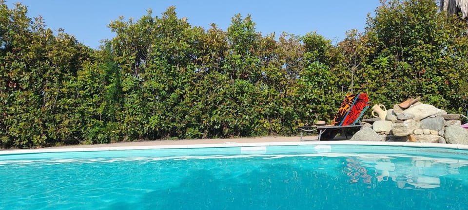 Property building, Living room, Swimming pool