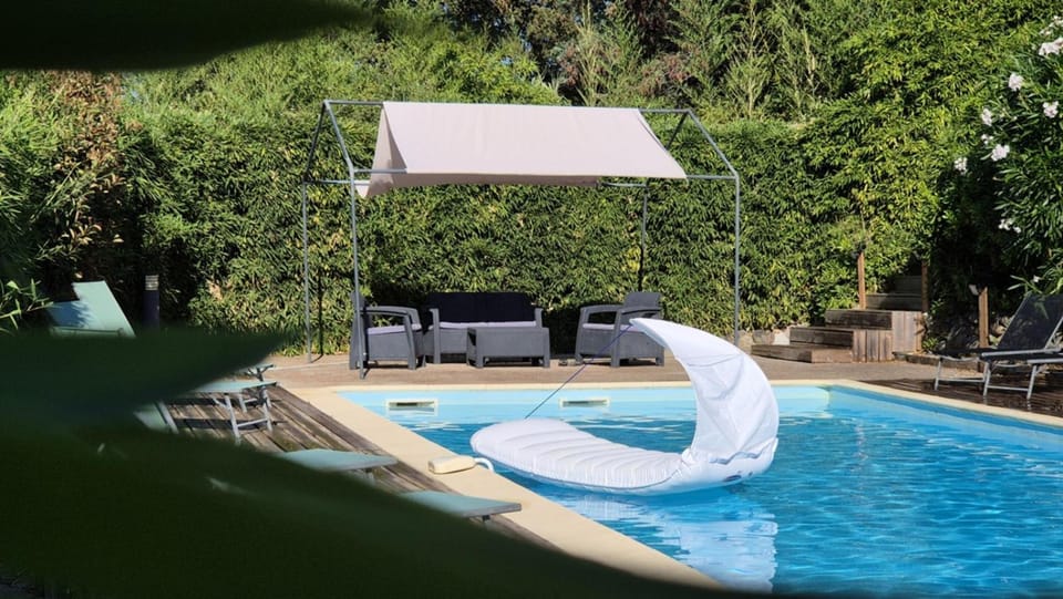 Property building, Living room, Swimming pool