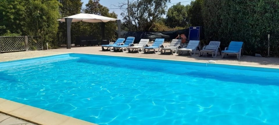 Property building, Living room, Swimming pool