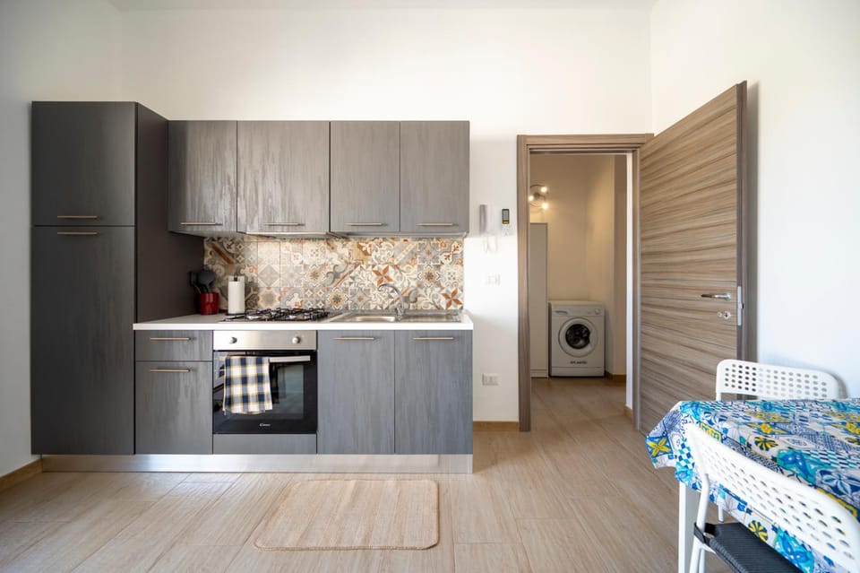 Kitchen or kitchenette, oven, stove