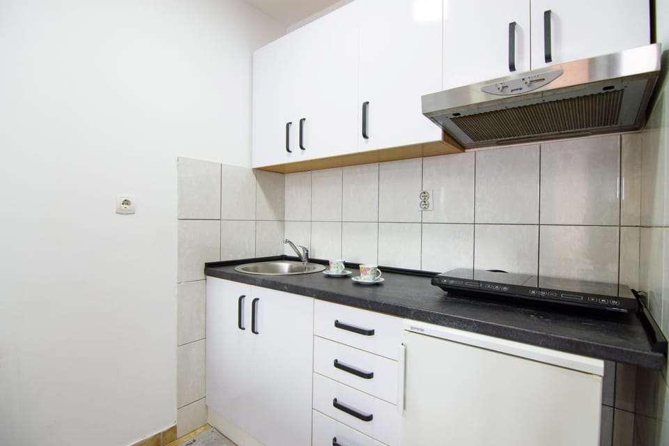 Kitchen or kitchenette, stove