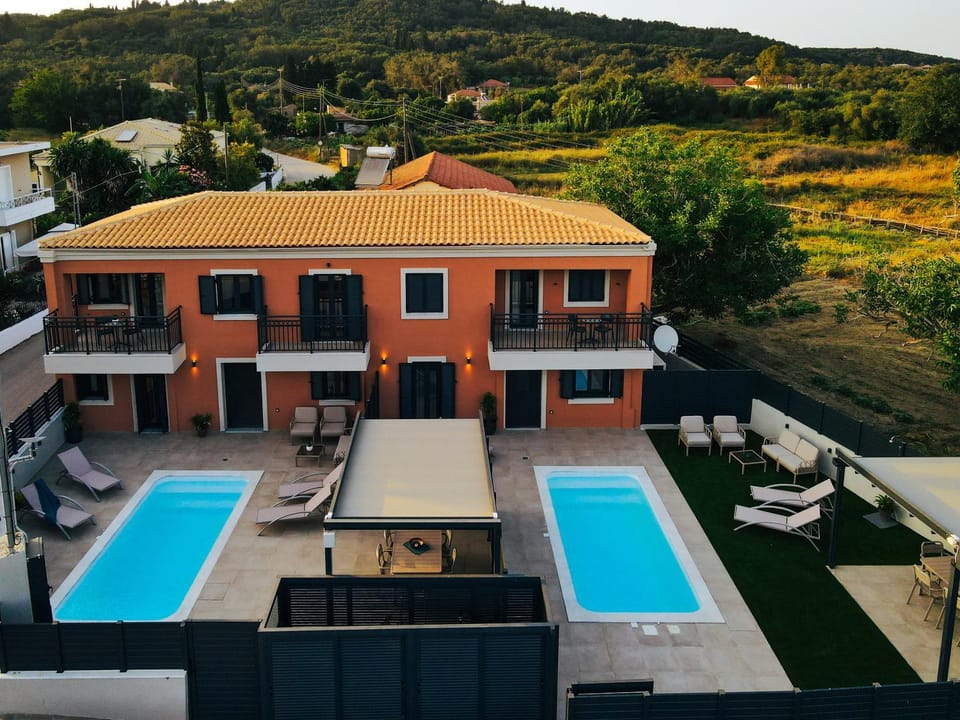 Property building, Patio, Day, Natural landscape, Mountain view, Pool view, Swimming pool, sunbed