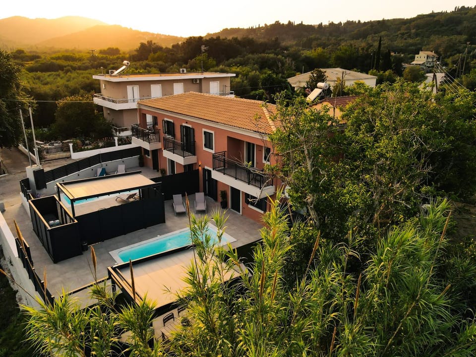 Property building, Natural landscape, Mountain view, Swimming pool, Sunset