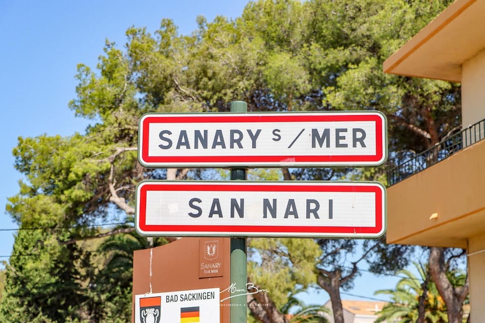 Nearby landmark, Day, Logo/Certificate/Sign, Text overlay