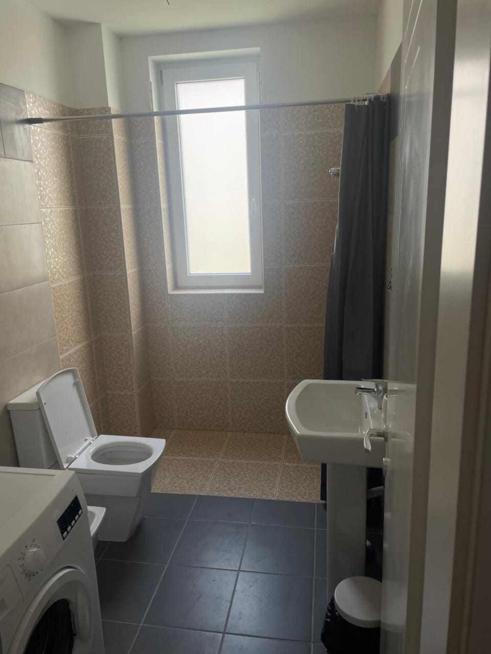 Shower, Toilet, Bathroom, bidet, towels, washing machine
