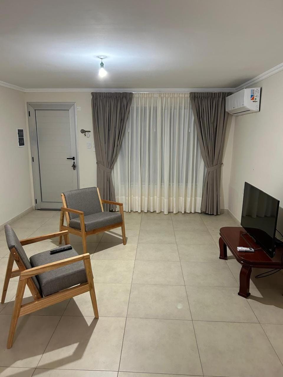 Communal lounge/ TV room, Living room, Seating area, air conditioner