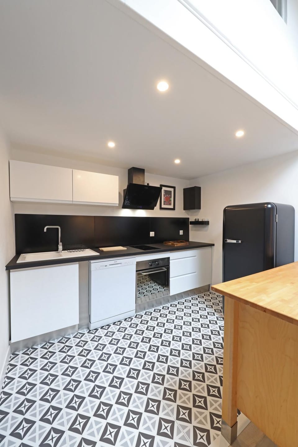 Kitchen or kitchenette, dishwasher, oven, stove, toaster
