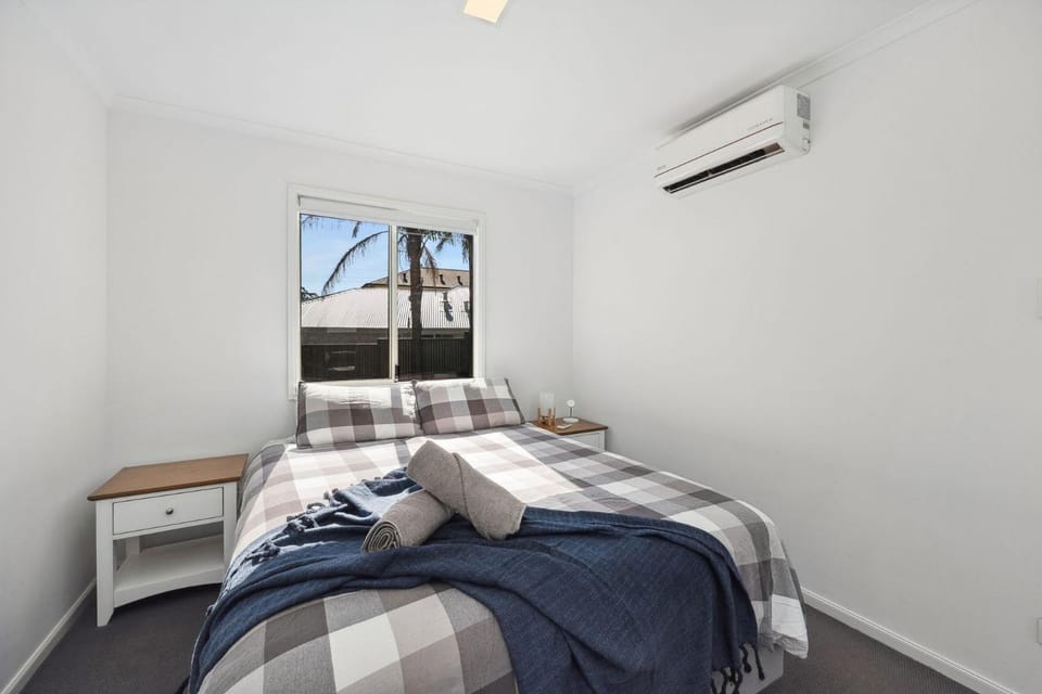 Bed, Photo of the whole room, Bedroom, towels, air conditioner