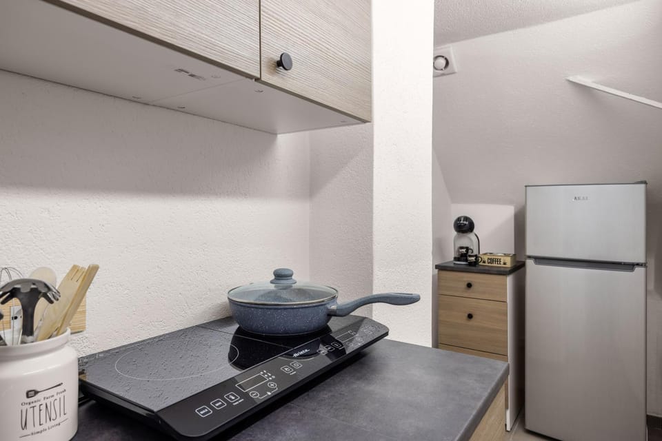 Kitchen or kitchenette, stove