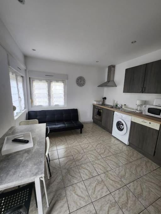 Kitchen or kitchenette, Living room, Seating area, Dining area, dishwasher, oven, stove, toaster, washing machine