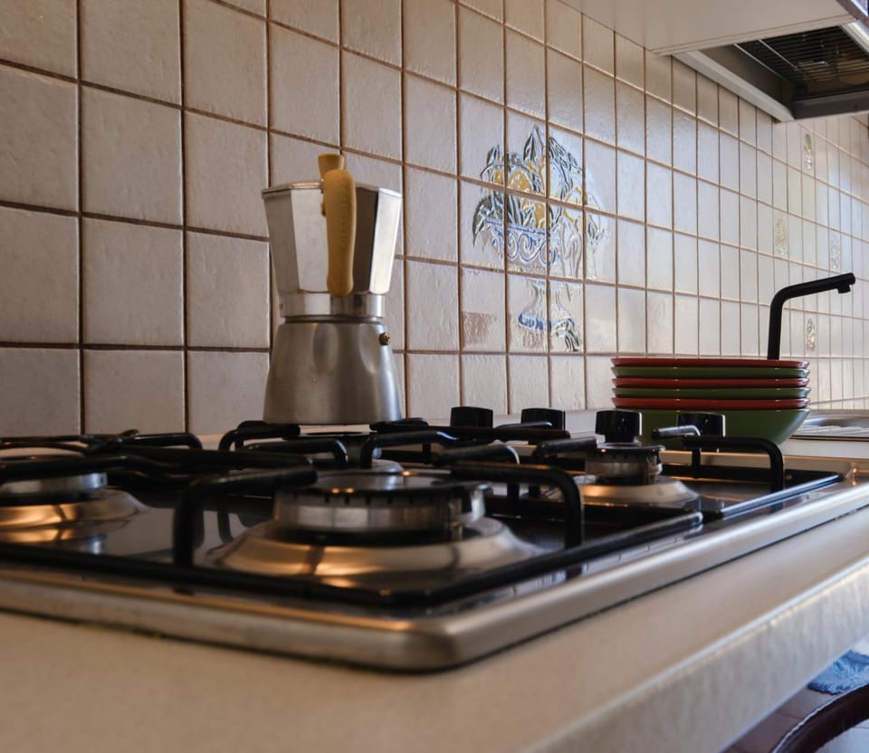 Kitchen or kitchenette, stove