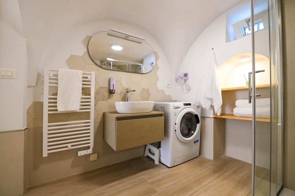 Bathroom, hair dryier, washing machine, dryer