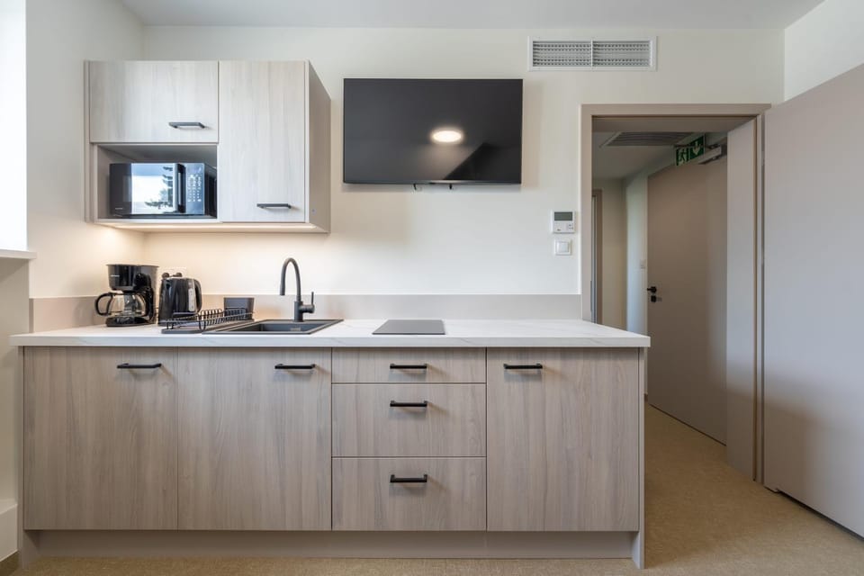 Kitchen or kitchenette, stove