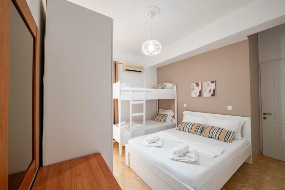 Bed, Photo of the whole room, Bedroom, bunk bed, towels, wardrobe, air conditioner