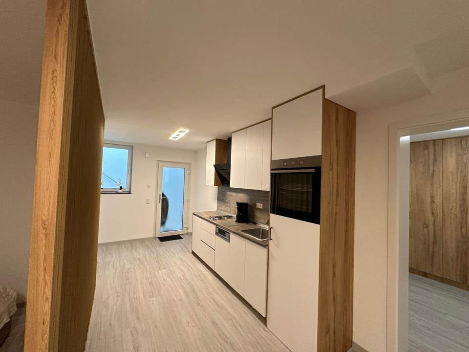 Kitchen or kitchenette, oven, stove
