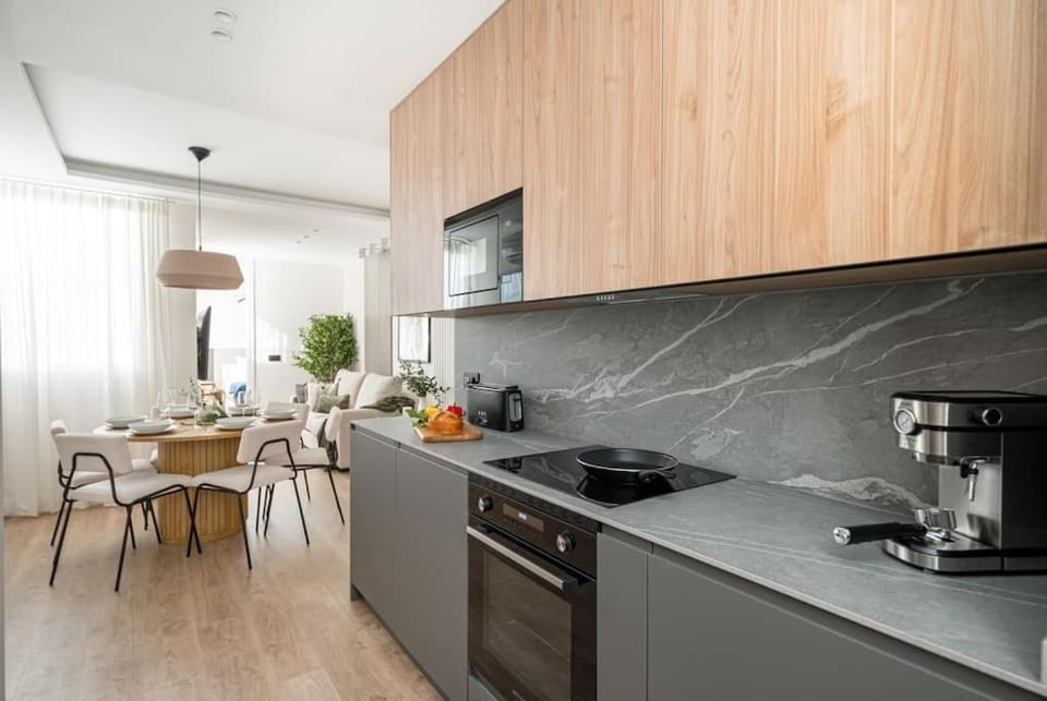Dining area, dishwasher, stove, toaster