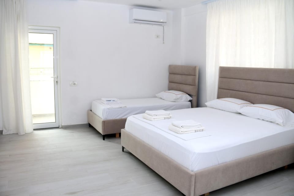 Bed, Bedroom, towels, air conditioner