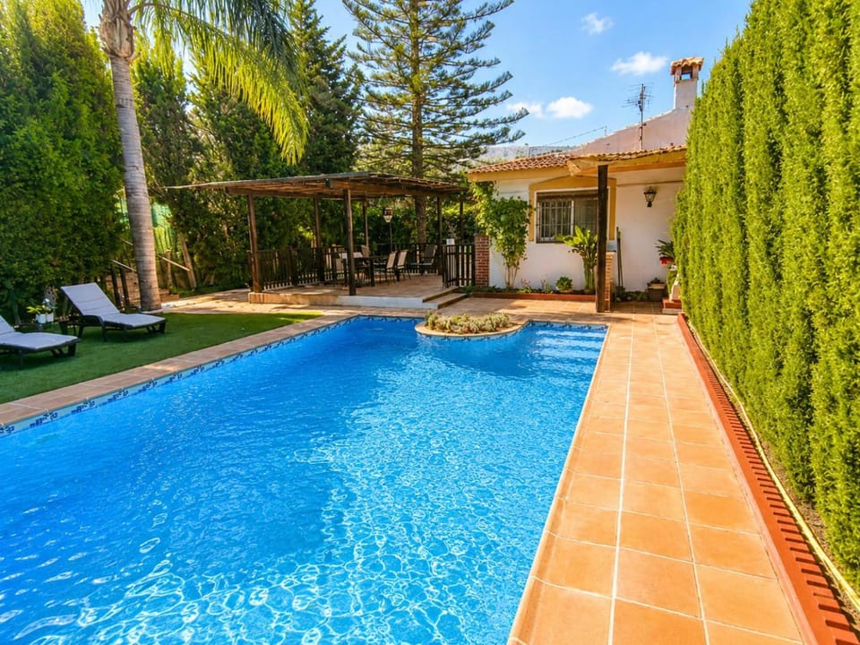 Property building, Patio, Day, Garden, Garden view, Pool view, Swimming pool, sunbed
