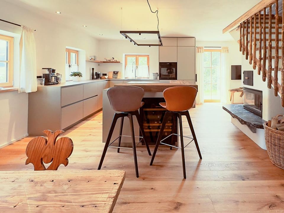 Seating area, minibar, stove, kitchen