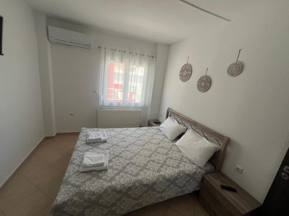 Bed, Photo of the whole room, Bedroom, towels, air conditioner