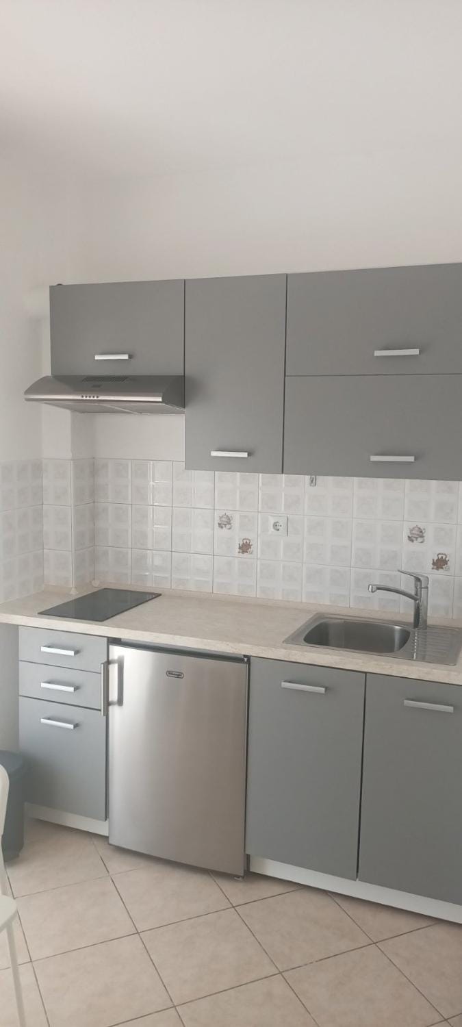 Kitchen or kitchenette, stove