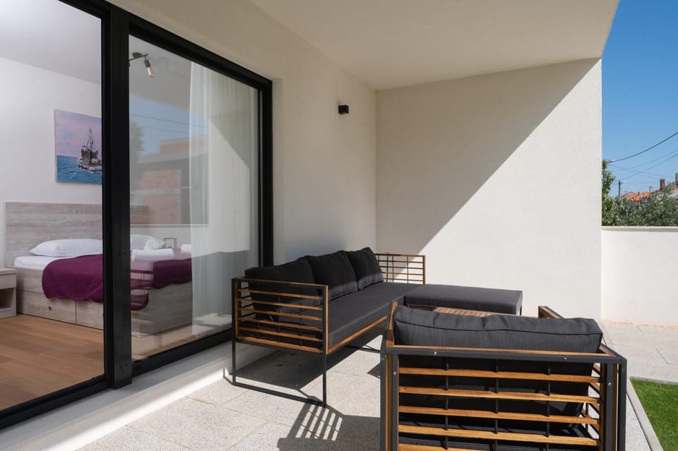 Patio, Bed, Day, View (from property/room), Seating area, Bedroom