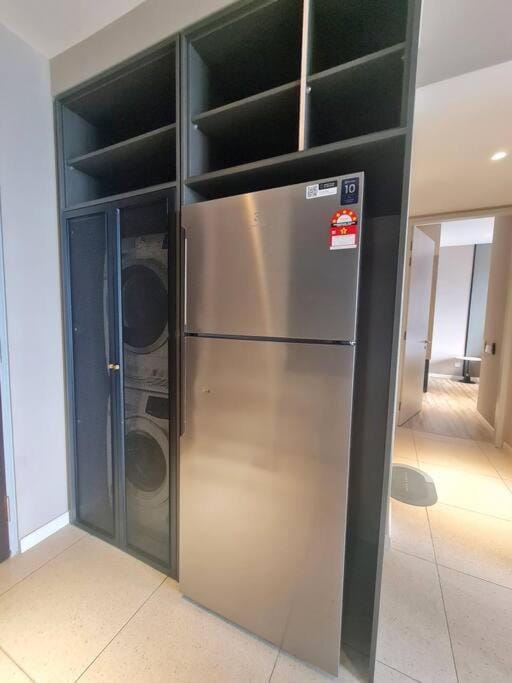 Kitchen or kitchenette, storage, washing machine, dryer