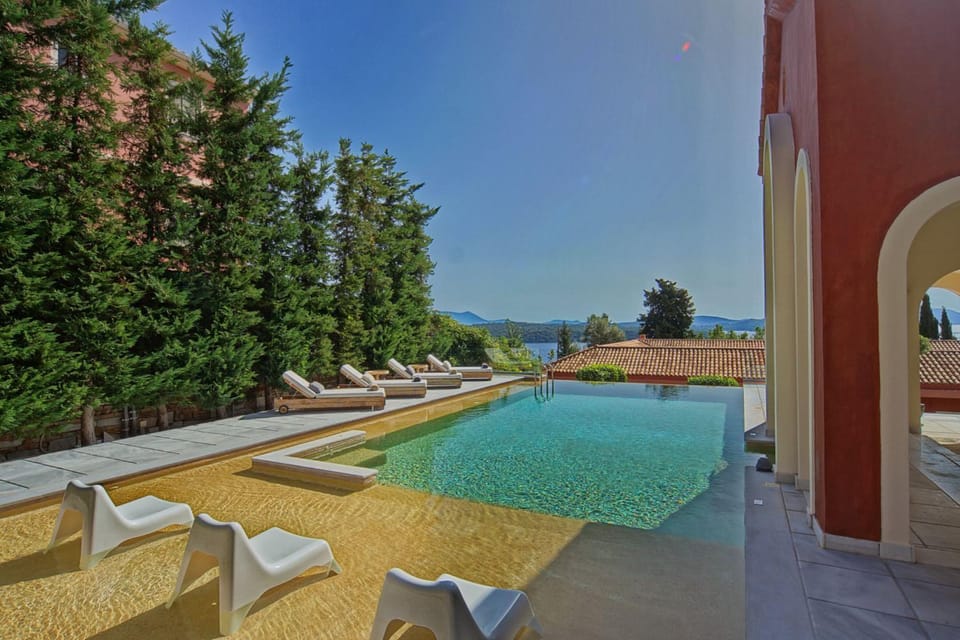 Patio, Day, Natural landscape, Pool view, Swimming pool, sunbed