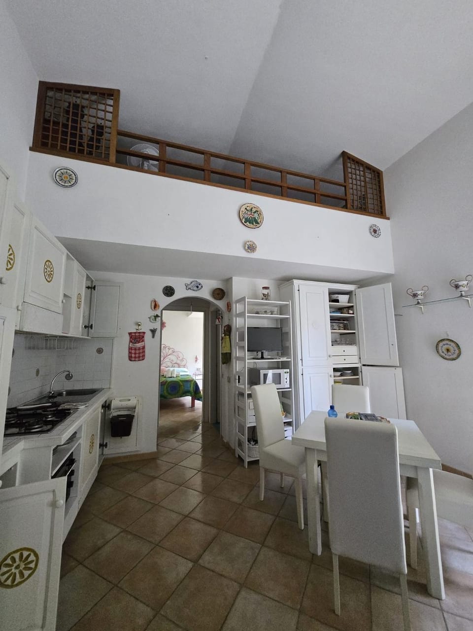 Kitchen or kitchenette, Dining area, oven, stove, washing machine