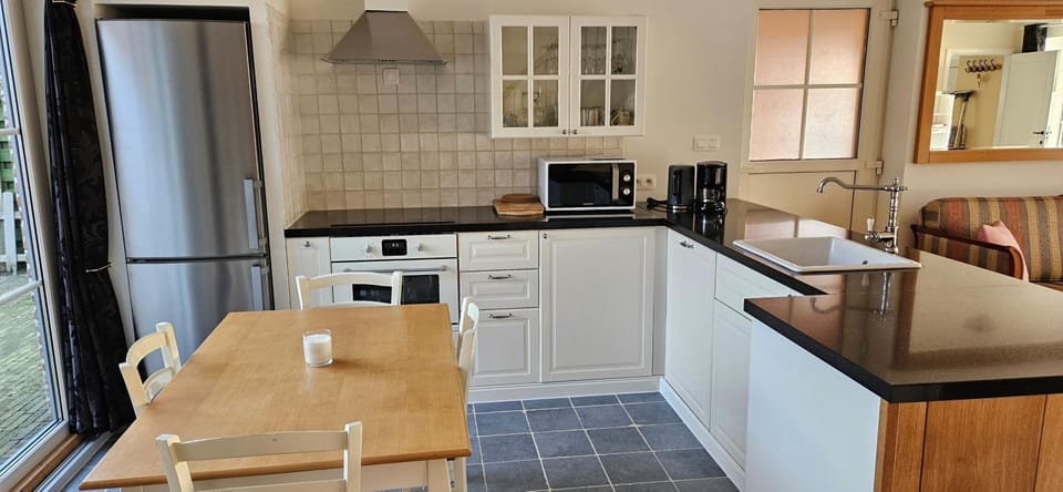 Kitchen or kitchenette, Dining area, dishwasher, oven, stove