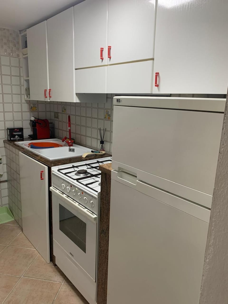 Kitchen or kitchenette, oven, stove