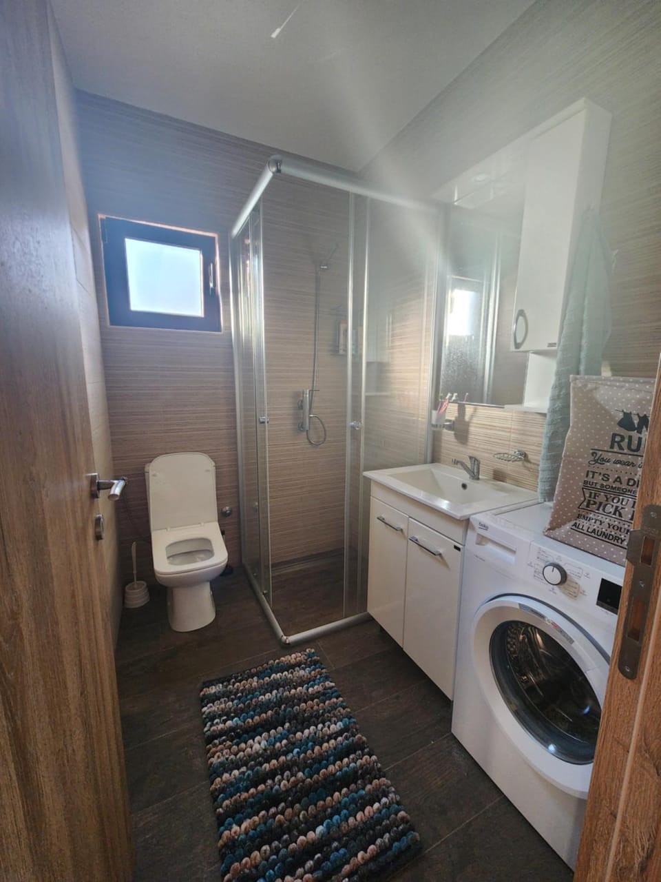 Shower, Toilet, Bathroom, towels, washing machine, dryer
