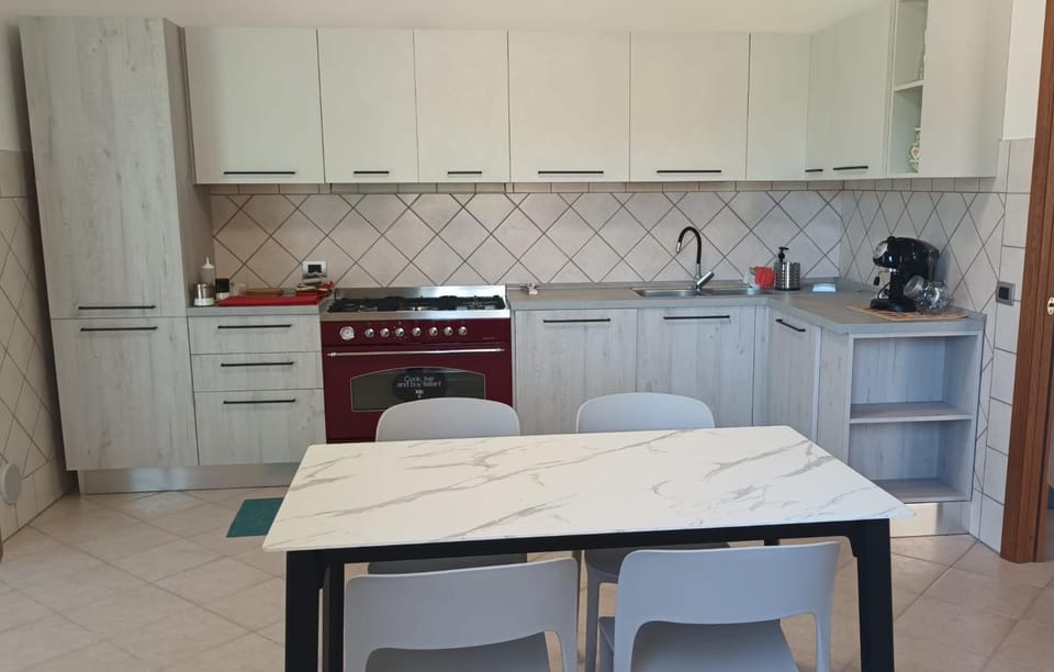Kitchen or kitchenette, stove