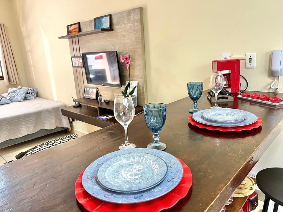 Studio pé na areia com área de churrasco privativa House in Bertioga