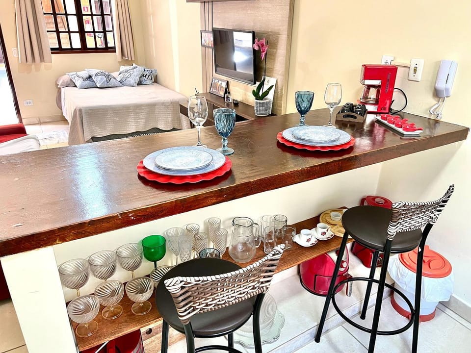 Studio pé na areia com área de churrasco privativa House in Bertioga