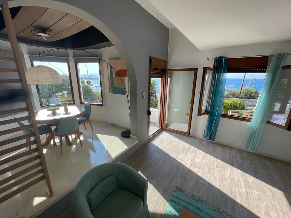 Natural landscape, View (from property/room), Balcony/Terrace, Living room, Seating area, Dining area, Sea view, Sea view