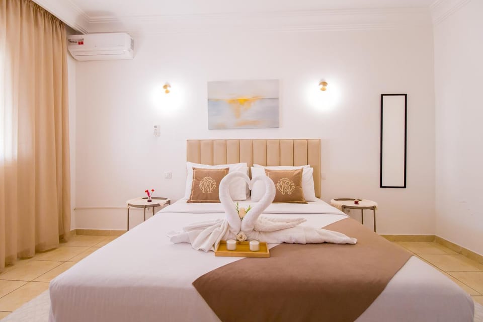 Photo of the whole room, Bedroom, towels, air conditioner
