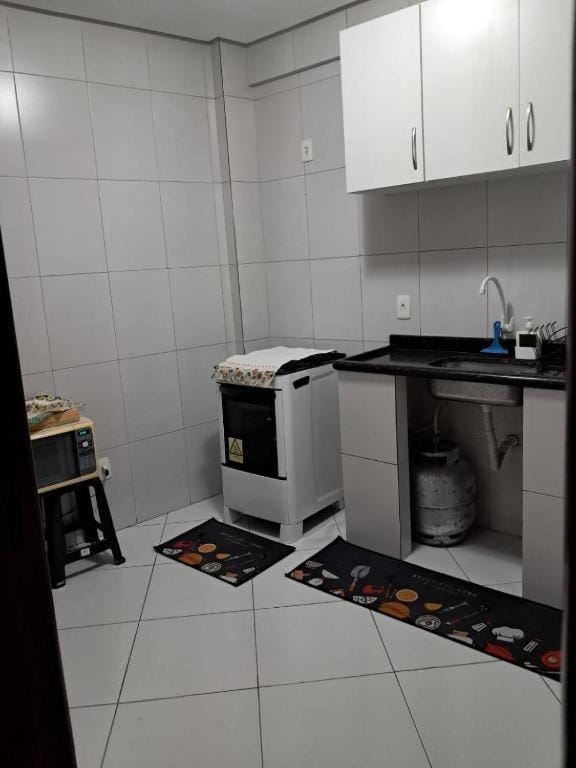 Kitchen or kitchenette, oven, stove