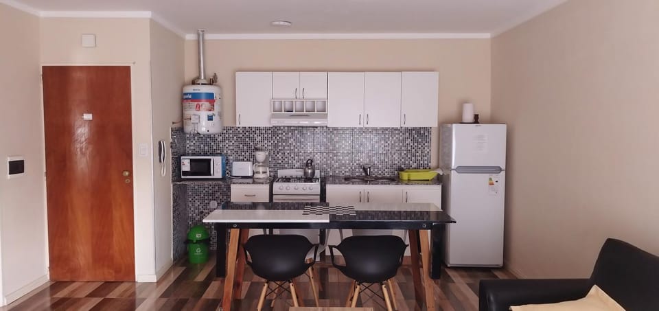 Kitchen or kitchenette, oven, stove, toaster